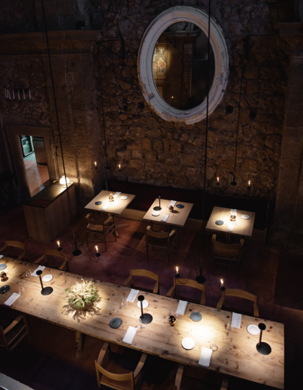 Une image contenant bougie, intérieur, mur, éclairage
Description générée automatiquement